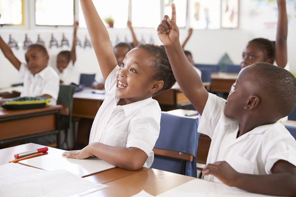 Read-and-Write-With-Joy-school-children-in-class